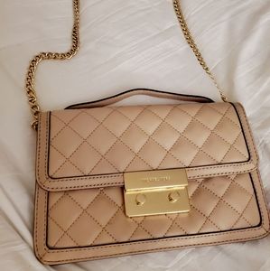 Michael Kors light pink leather purse with gokd chain